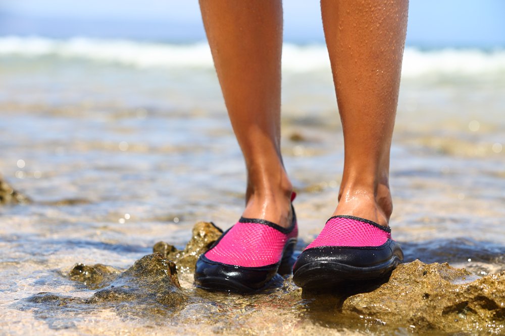 woman wearing water shoes